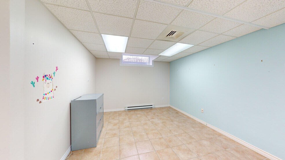 More Photos Of 2001 Rue Price, Saguenay Office Residential For Lease