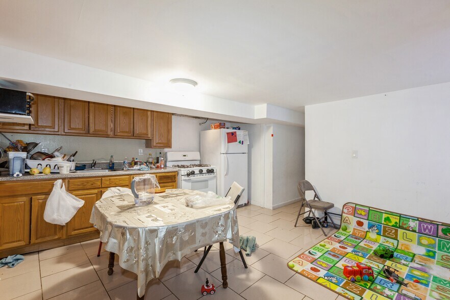 More Photos Of 100-10-100-12 103rd Ave, Ozone Park Multifamily For Sale