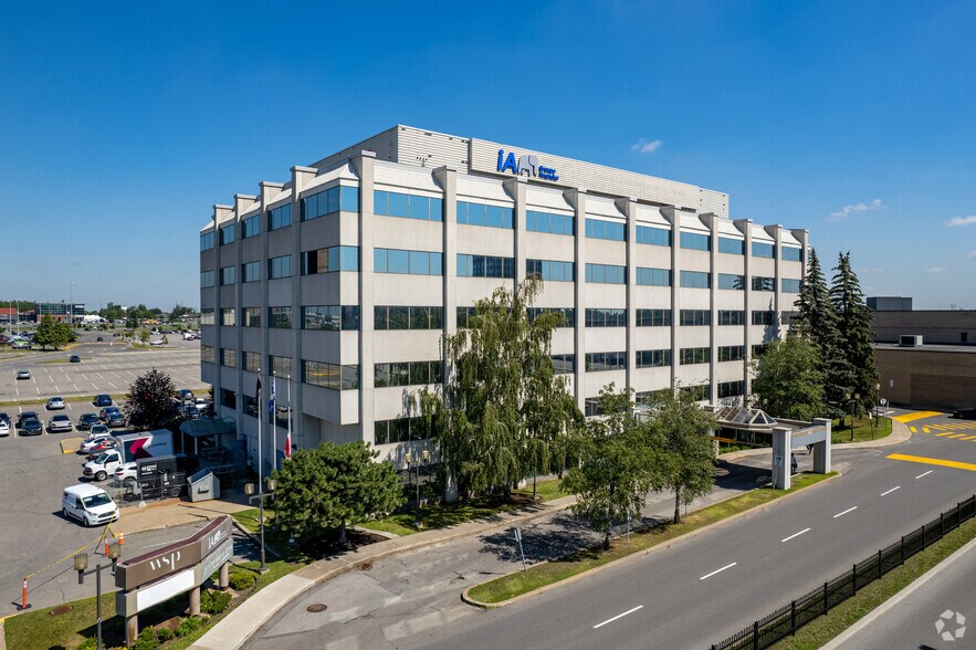 Primary Photo Of 2525 Boul Daniel-Johnson, Laval Office For Sale