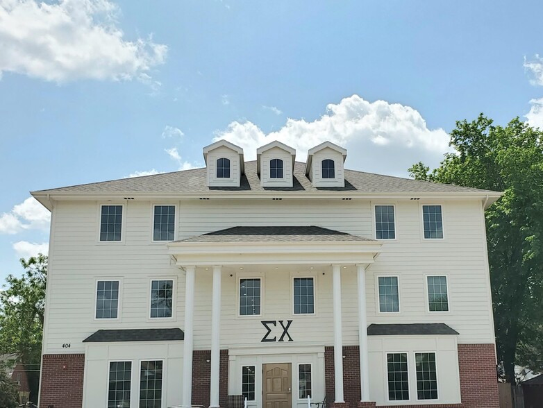 Primary Photo Of 404 W 7th St, Hays Sorority Fraternity House For Sale