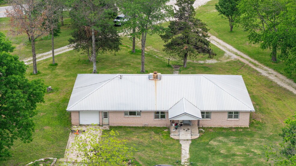 More Photos Of 25421 US-59, Grove Land For Sale