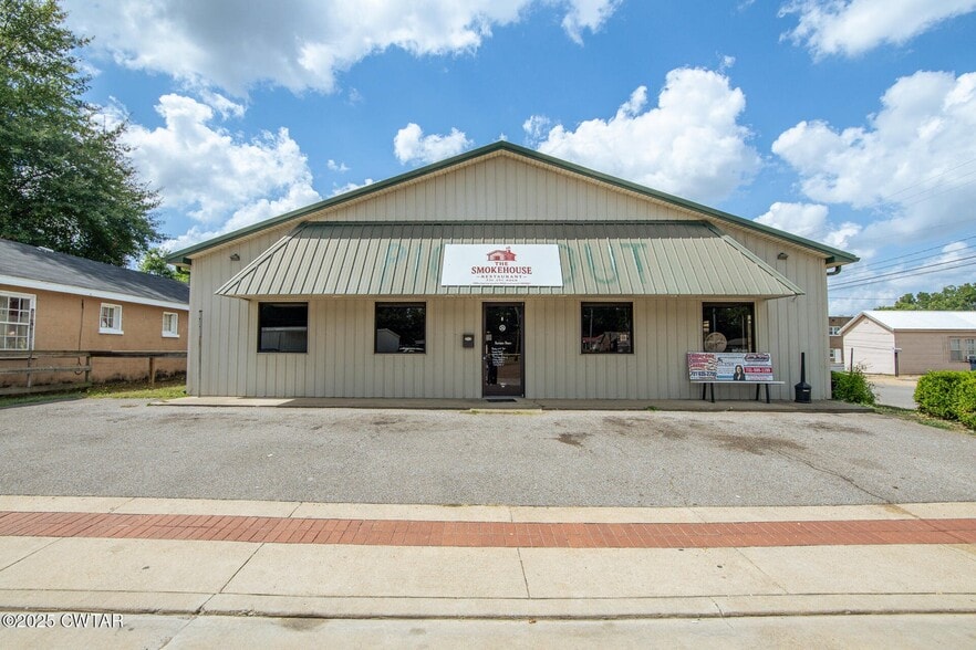 Primary Photo Of 225 N Front St, Halls General Retail For Sale