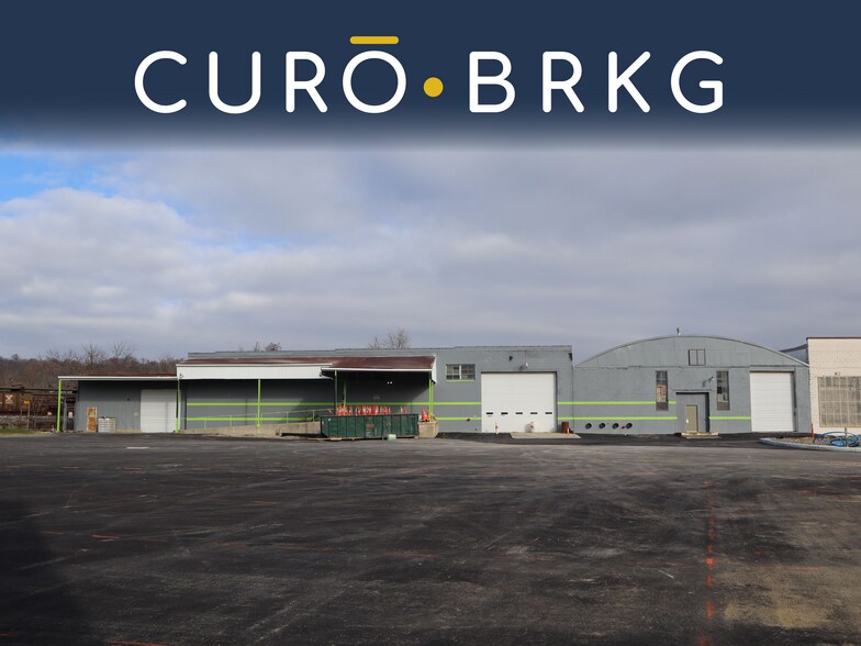 Primary Photo Of 134 W 38th St, Covington Warehouse For Sale