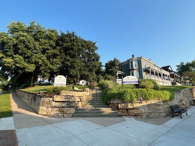 Primary Photo Of 208 N Cody Rd, Le Claire Storefront Retail Residential For Sale