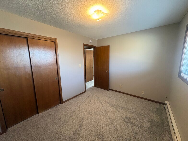 More Photos Of 113 2nd St NE, Mitchellville Apartments For Sale