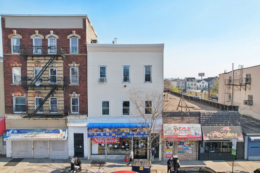 Primary Photo Of 67 Broadway, Newark Storefront Retail Residential For Sale