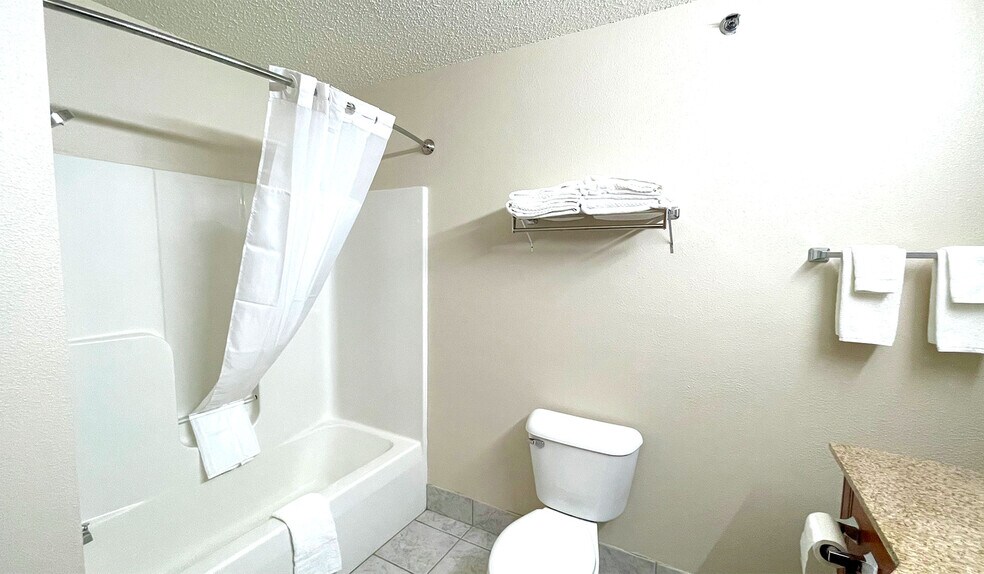 More Photos Of 717 E Bannerman Ave, Redgranite Hotel For Sale