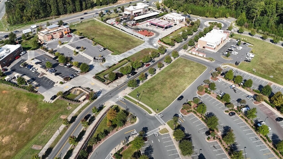 More Photos Of 11257 Bryton Town Center Dr, Huntersville General Retail For Lease