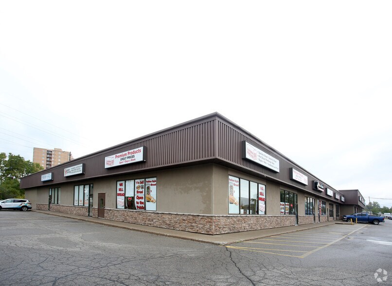 Primary Photo Of 317 Adelaide St S, London Storefront For Lease