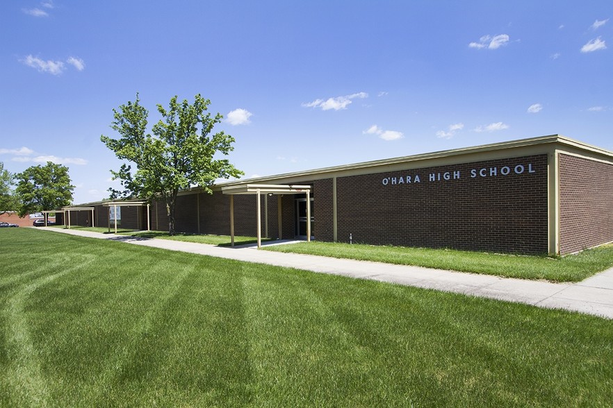 Primary Photo Of 9001 James A Reed Rd, Kansas City Schools For Lease