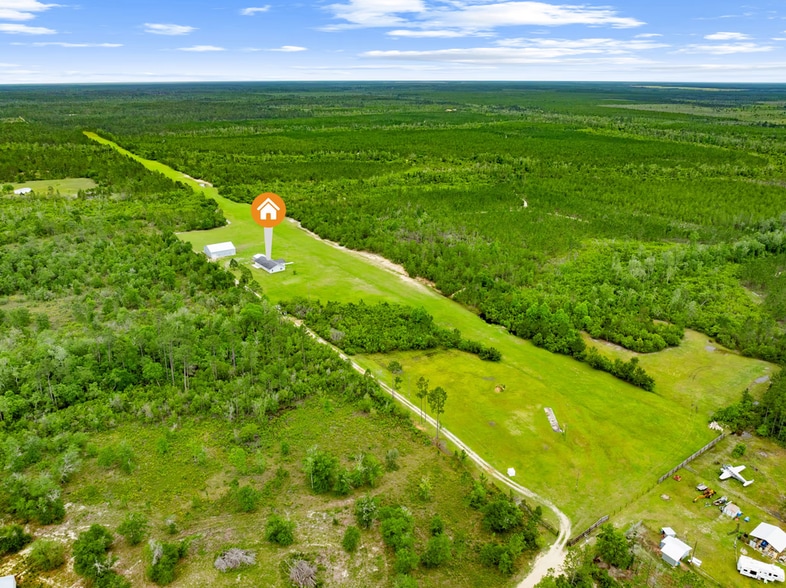 More Photos Of 22303 Longleaf Rd NW, Fountain Airport For Sale
