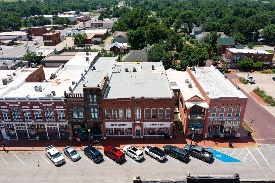 Primary Photo Of 117 W Harrison Ave, Guthrie Storefront Retail Residential For Sale