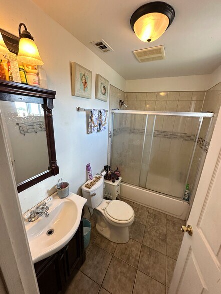 More Photos Of 9123 Orchard Ave, Los Angeles Multifamily For Sale