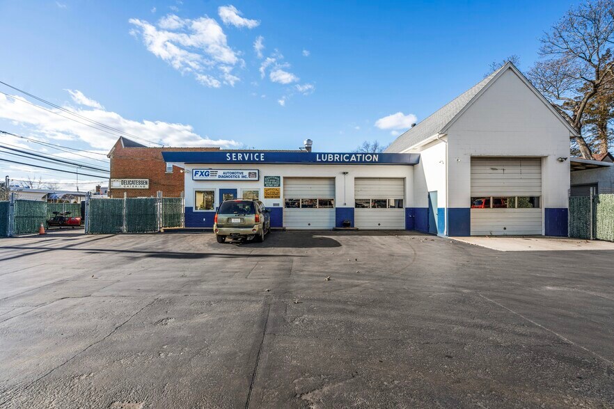Primary Photo Of 635 Seaman Ave, North Baldwin Auto Repair For Sale
