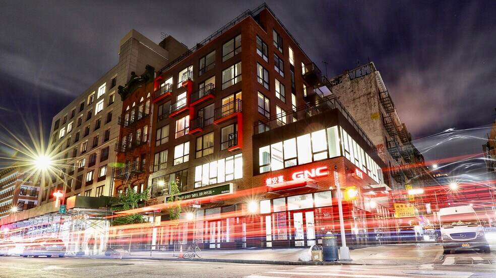 Primary Photo Of 223-227 Grand St, New York Storefront Retail Residential For Lease