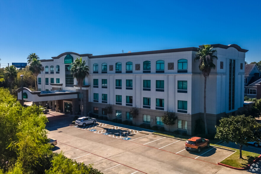 Primary Photo Of 9050 Mills Rd, Houston Hotel For Sale