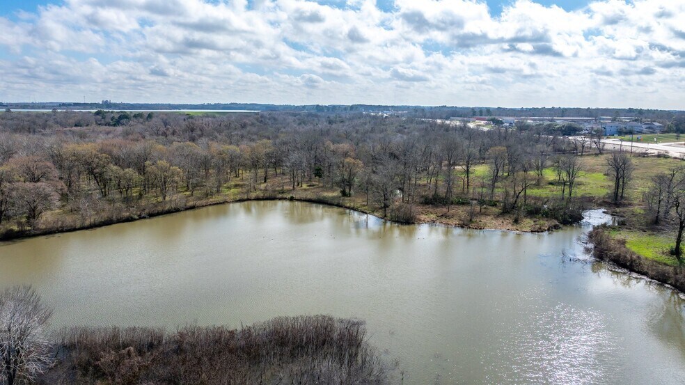 More Photos Of Lake Conroe Hills Dr & FM 1097 W, Willis Land For Sale