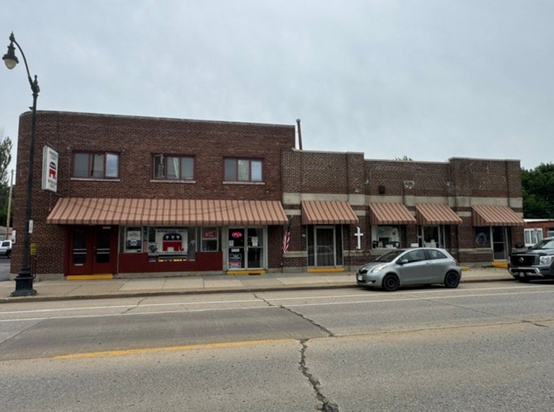 Primary Photo Of 740 N Main St, Oshkosh Storefront Retail Residential For Sale