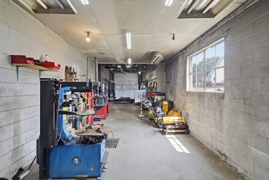 More Photos Of 455 Center Ave, Romney Auto Repair For Sale