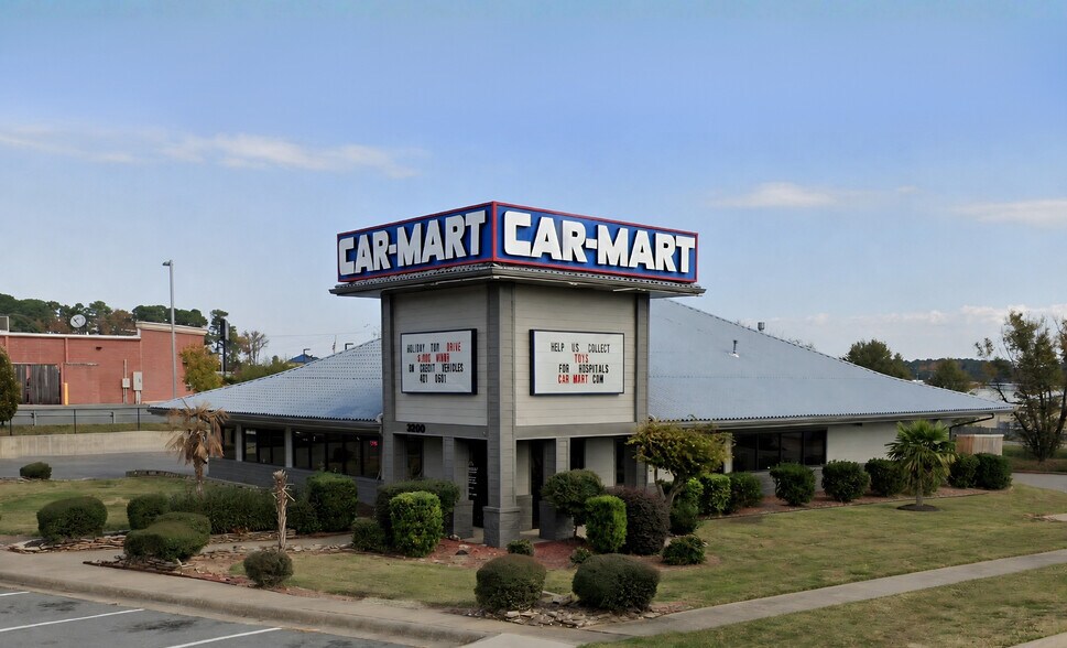 Primary Photo Of 3200 N Reynolds Rd, Bryant Auto Dealership For Sale