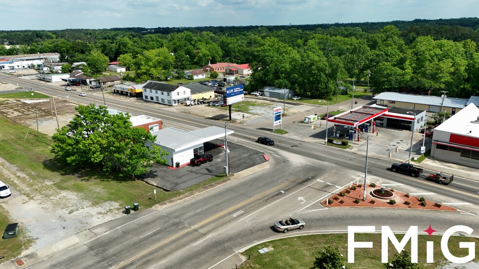 More Photos Of 101 E Cumming Ave, Opp Mixed Retail For Sale