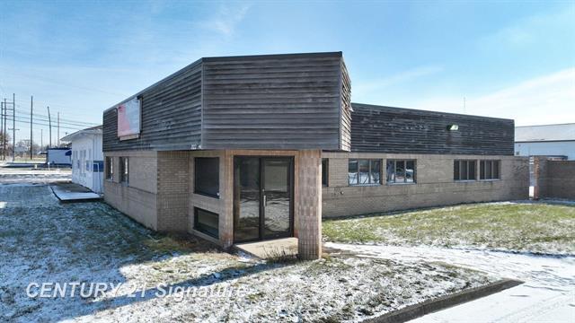 Primary Photo Of 2122 E Hemphill Rd, Burton Industrial For Sale