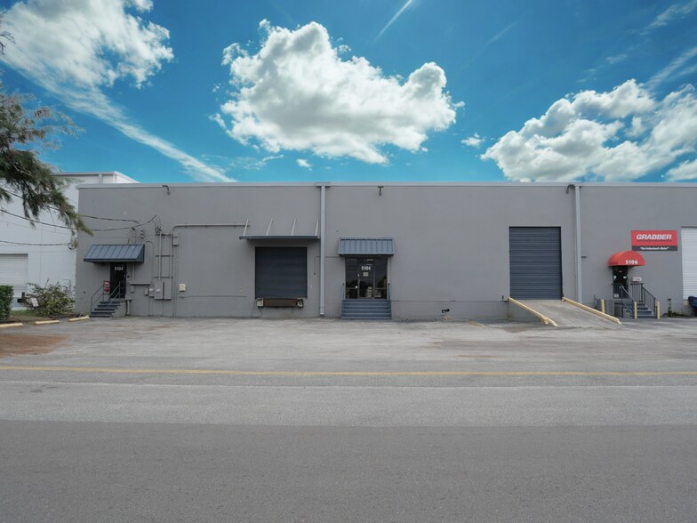 Primary Photo Of 5104-5108 W Hanna Ave, Tampa Warehouse For Lease