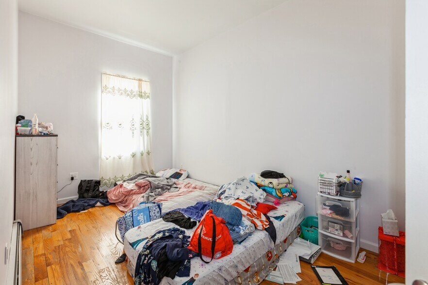 More Photos Of 100-10-100-12 103rd Ave, Ozone Park Multifamily For Sale