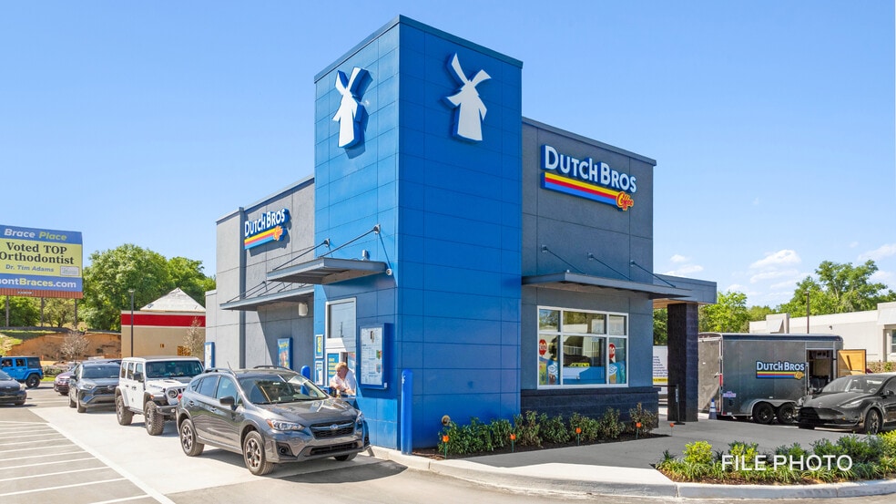 Primary Photo Of 11960 Alabama rd, Woodstock General Retail For Sale