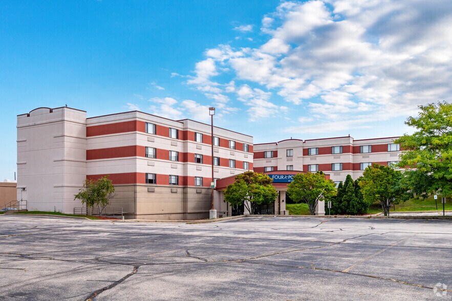 Primary Photo Of 5311 S Howell Ave, Milwaukee Hotel For Sale