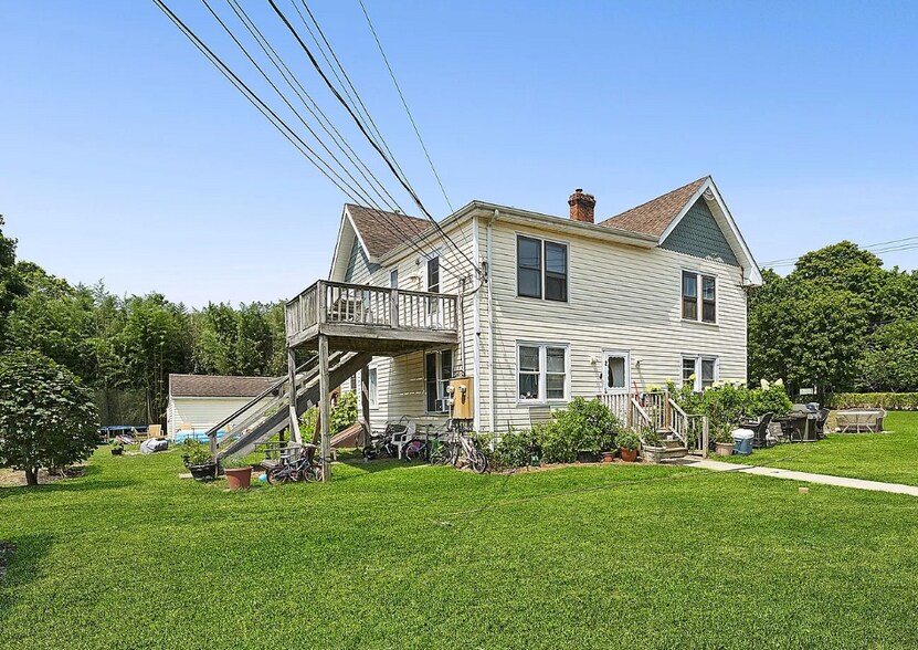 More Photos Of 134 Ponquogue Ave, Hampton Bays Apartments For Sale