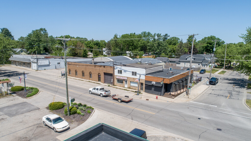 Primary Photo Of 241 W Randall St, Coopersville Warehouse For Sale