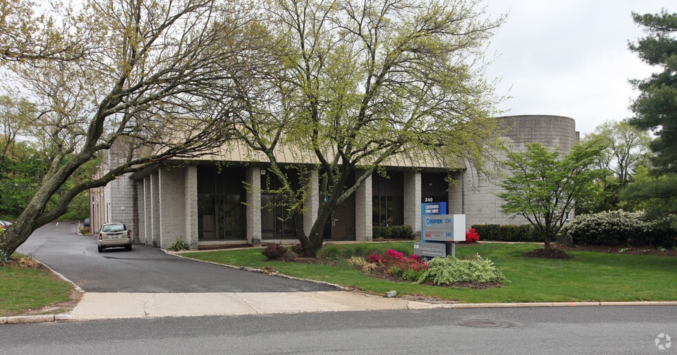Primary Photo Of 230-240 Crossways Park Dr, Woodbury Office For Sale