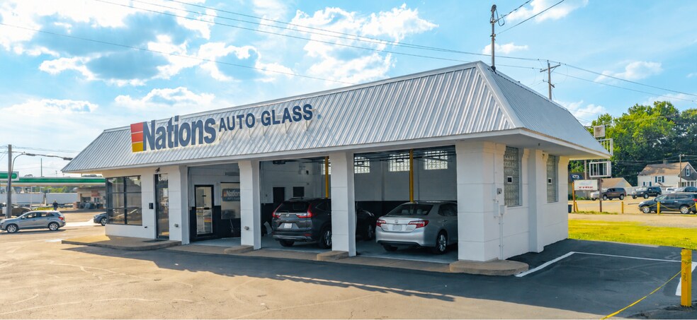 Primary Photo Of 2105 Columbus Rd NE, Canton Auto Repair For Sale