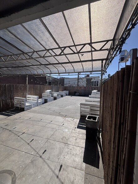 More Photos Of 3819 69th St, Woodside Bar For Lease