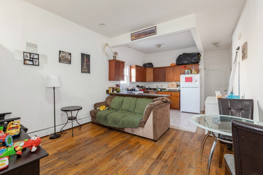 More Photos Of 100-10-100-12 103rd Ave, Ozone Park Multifamily For Sale