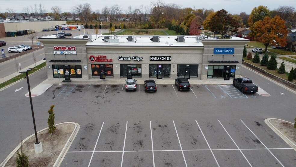 Primary Photo Of 25377-25397 Schoenherr Rd, Warren Storefront For Lease