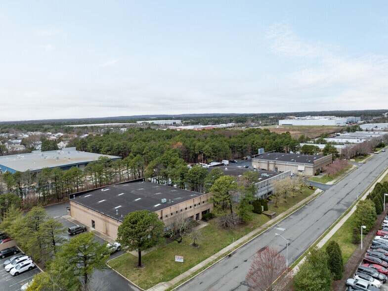 More Photos Of 28 Sawgrass Dr, Bellport Village Manufacturing For Sale