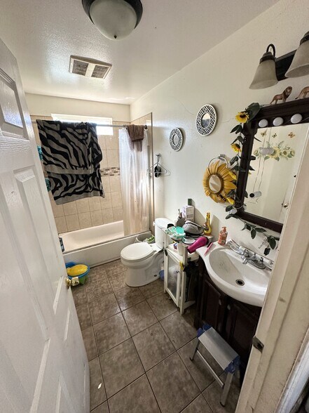 More Photos Of 9123 Orchard Ave, Los Angeles Multifamily For Sale