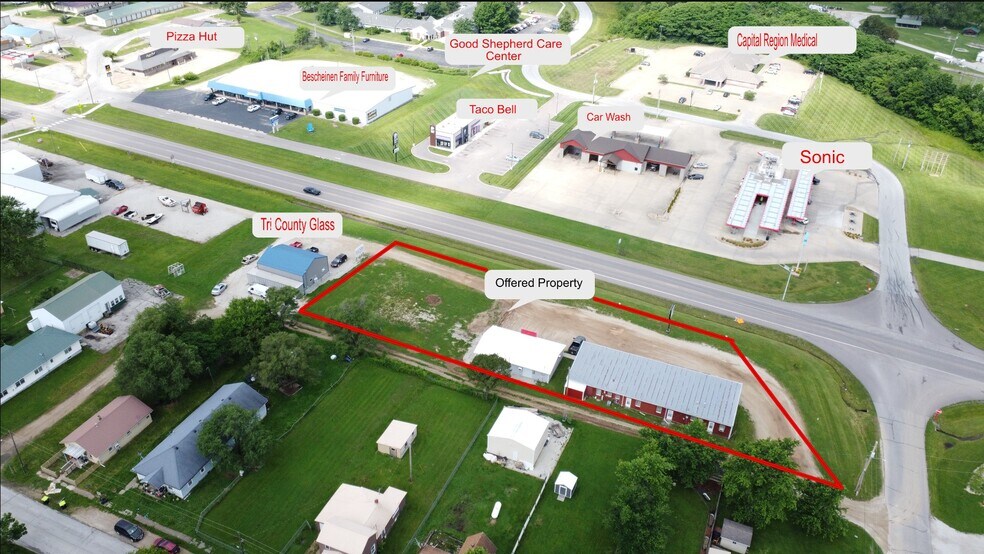 Primary Photo Of 402-412 S State Highway 5, Versailles General Retail For Sale