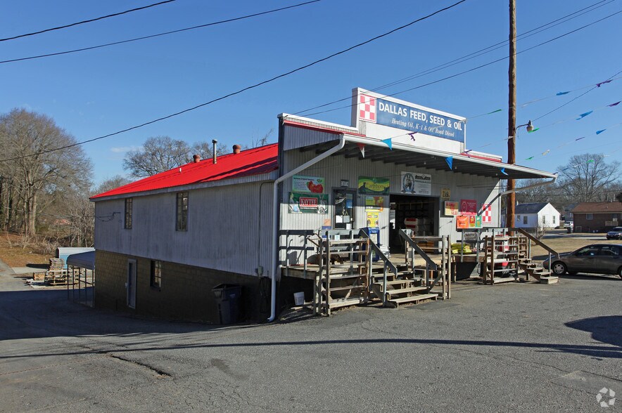Primary Photo Of 214 E Trade St, Dallas Freestanding For Sale