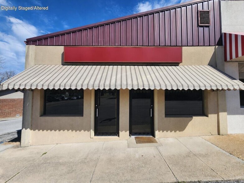 Primary Photo Of 132 W Washington Ave, Ava Medical For Sale