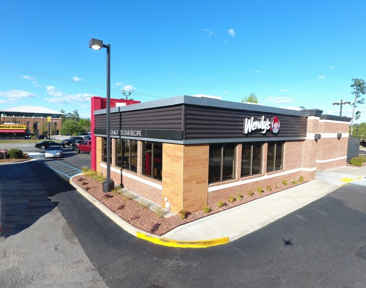 Primary Photo Of 9145 University Blvd, Charleston Fast Food For Sale
