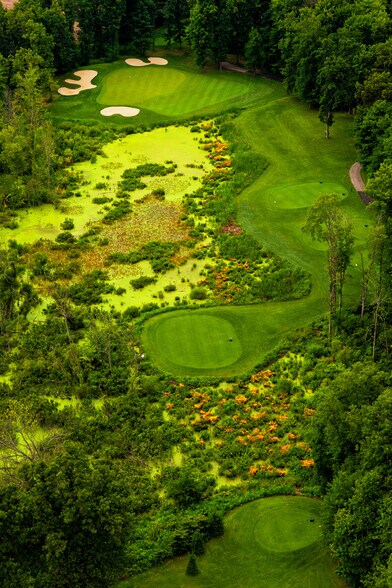 More Photos Of 61809 Stonegate Dr, Centreville Golf Course Driving Range For Sale