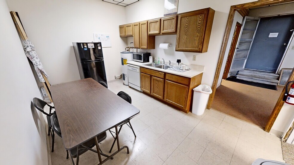 More Photos Of 103-105 E 27th St, Hays Office For Sale