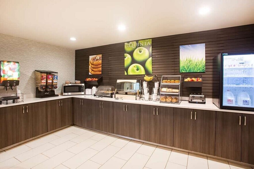 More Photos Of 14 Regency Pky, Granite City Hotel For Sale