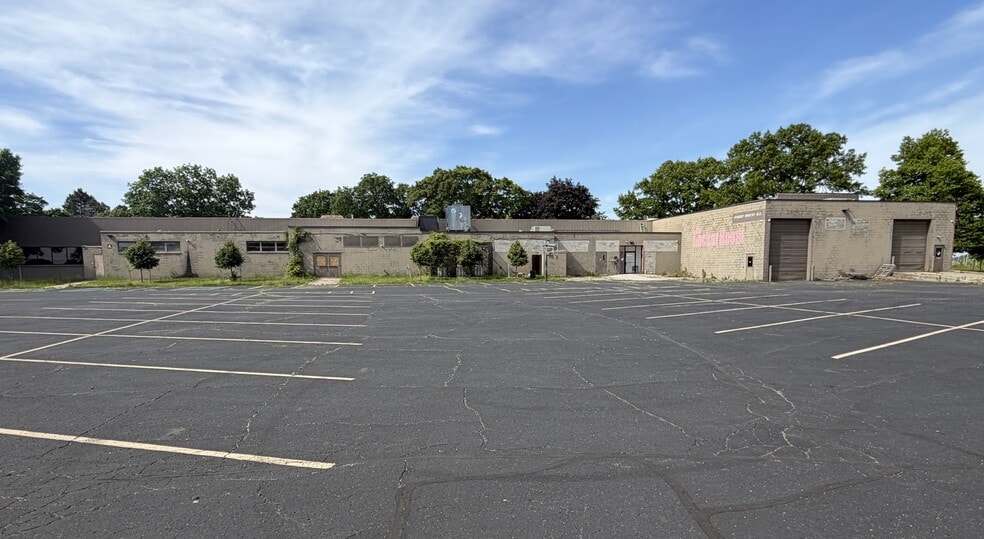 Primary Photo Of 850 Ladd Rd, Walled Lake Warehouse For Sale