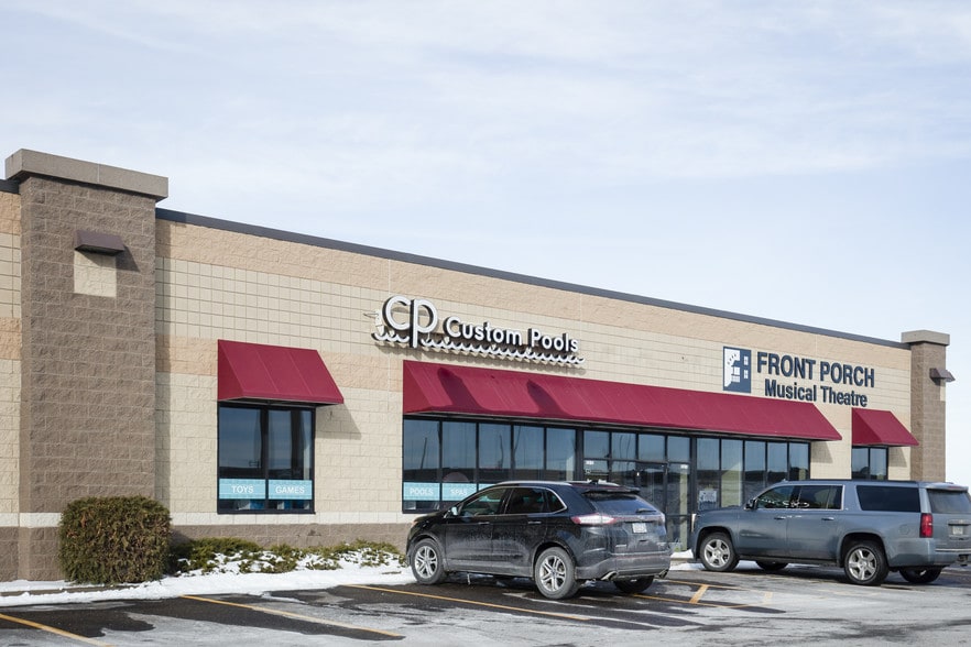 More Photos Of 14140-14198 Northdale Blvd, Rogers Showroom For Lease