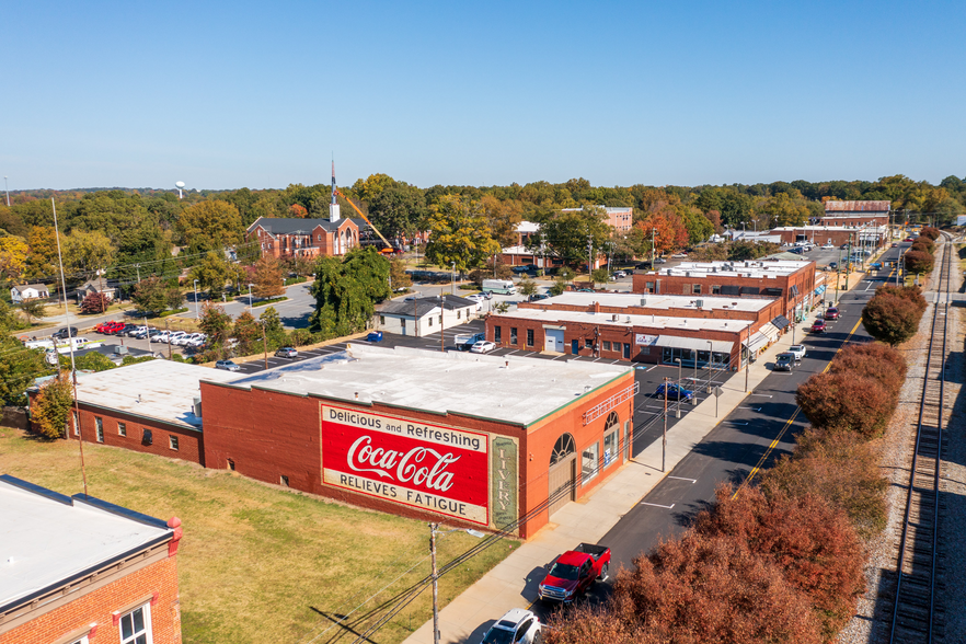 Primary Photo Of 128-162 N Broad St, Mooresville General Retail For Sale