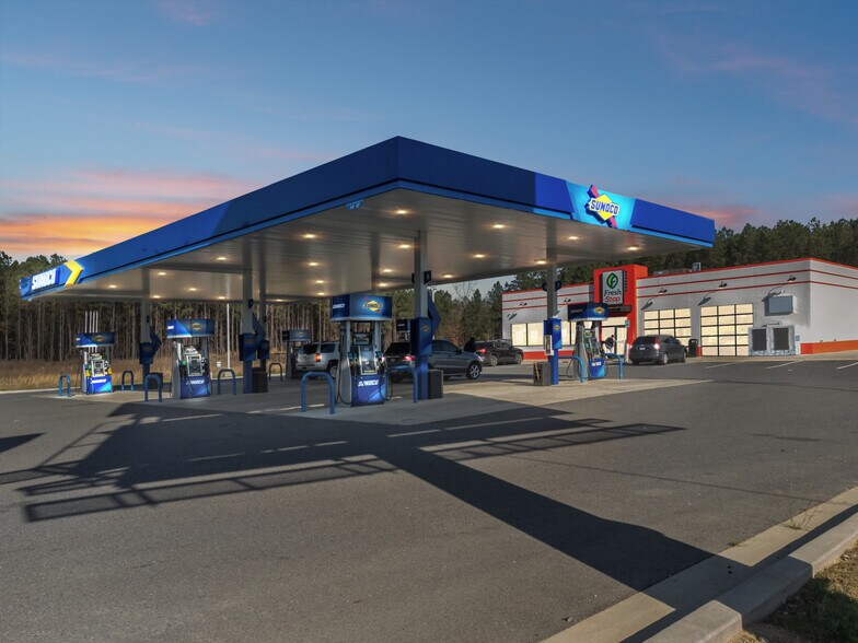 Primary Photo Of 7209 E Grand Ave, Lonsdale General Retail For Sale